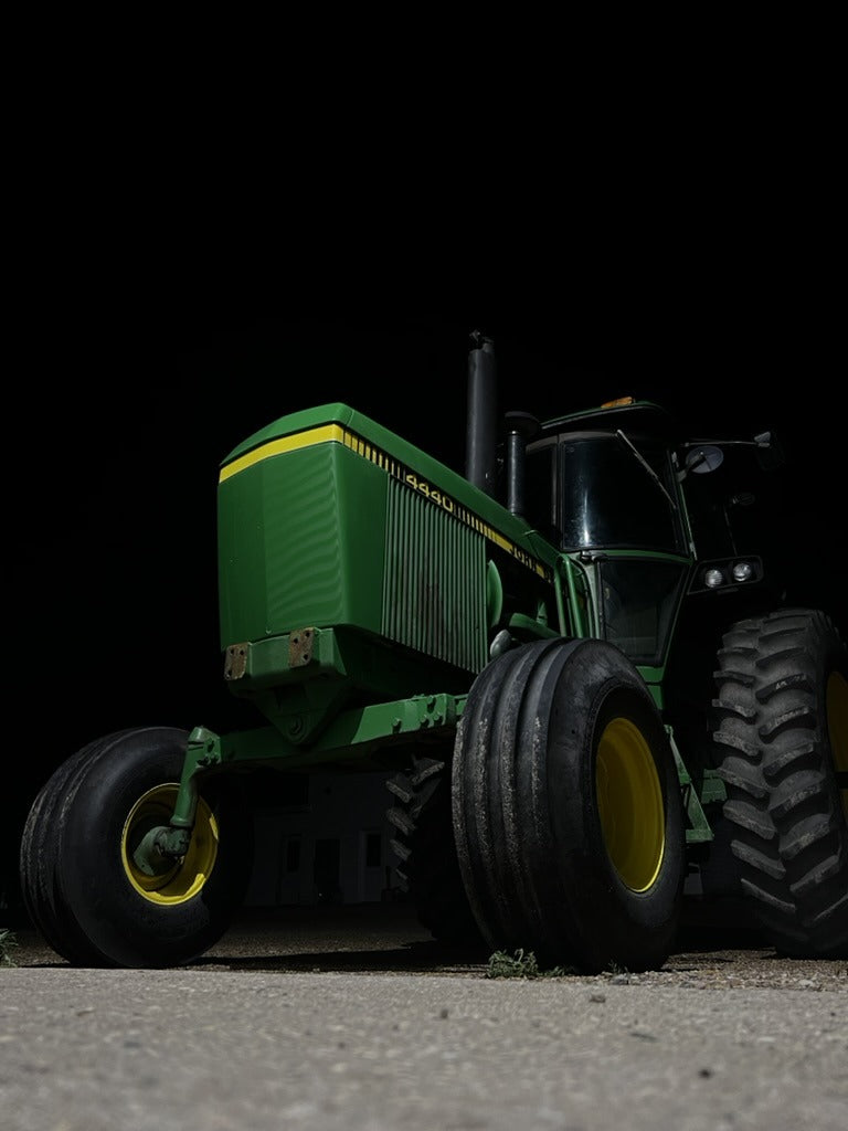 John Deere 4440 SoundGard cab with a 3D-printed cup holder in the ashtray opening