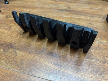 Magnetic Pry Bar Holder for service trucks, 3D-printed by Farm Sip Supreme, in the cab